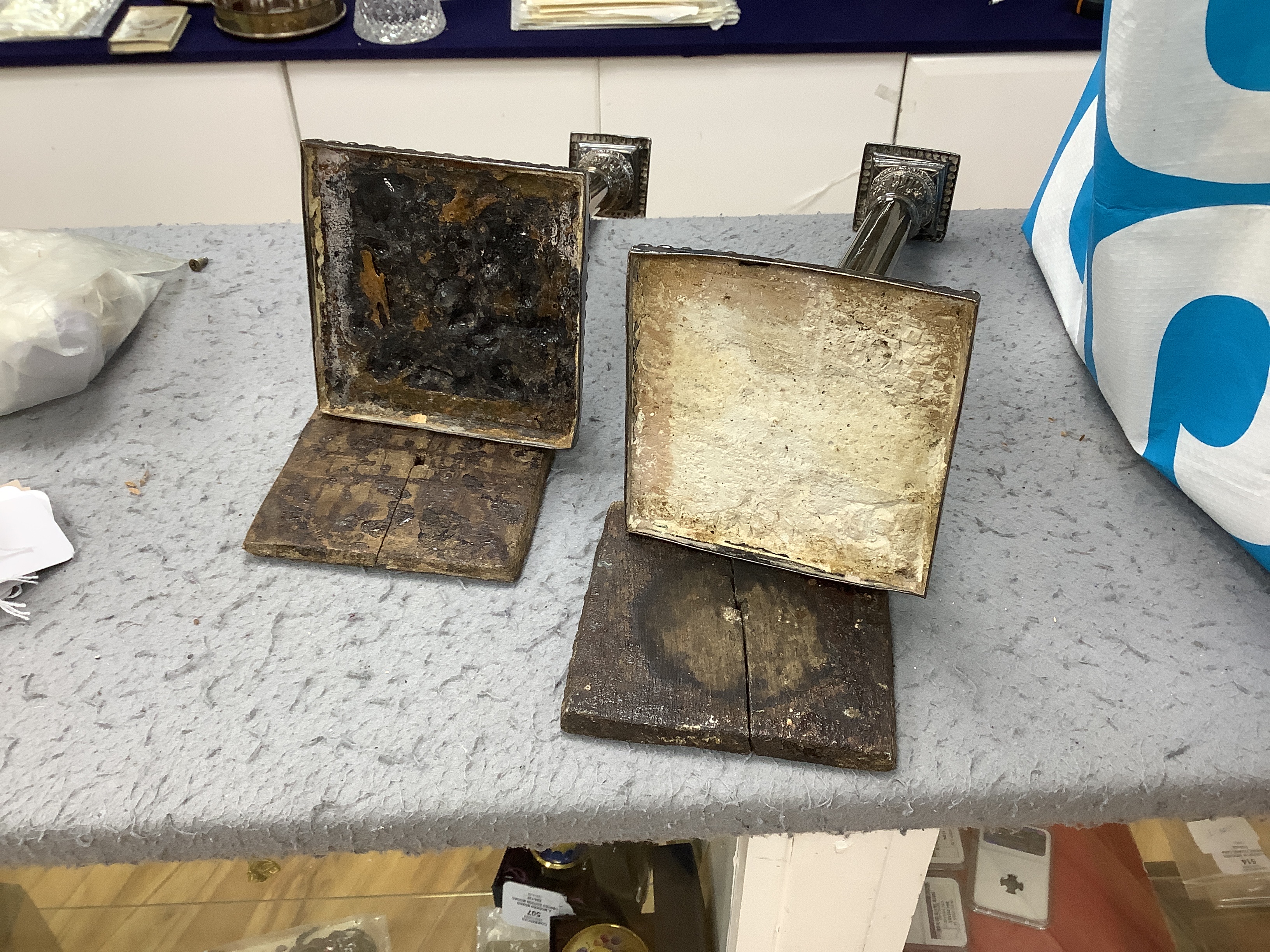 A pair of Georgian Old Sheffield Plate candlesticks, 31.5cm